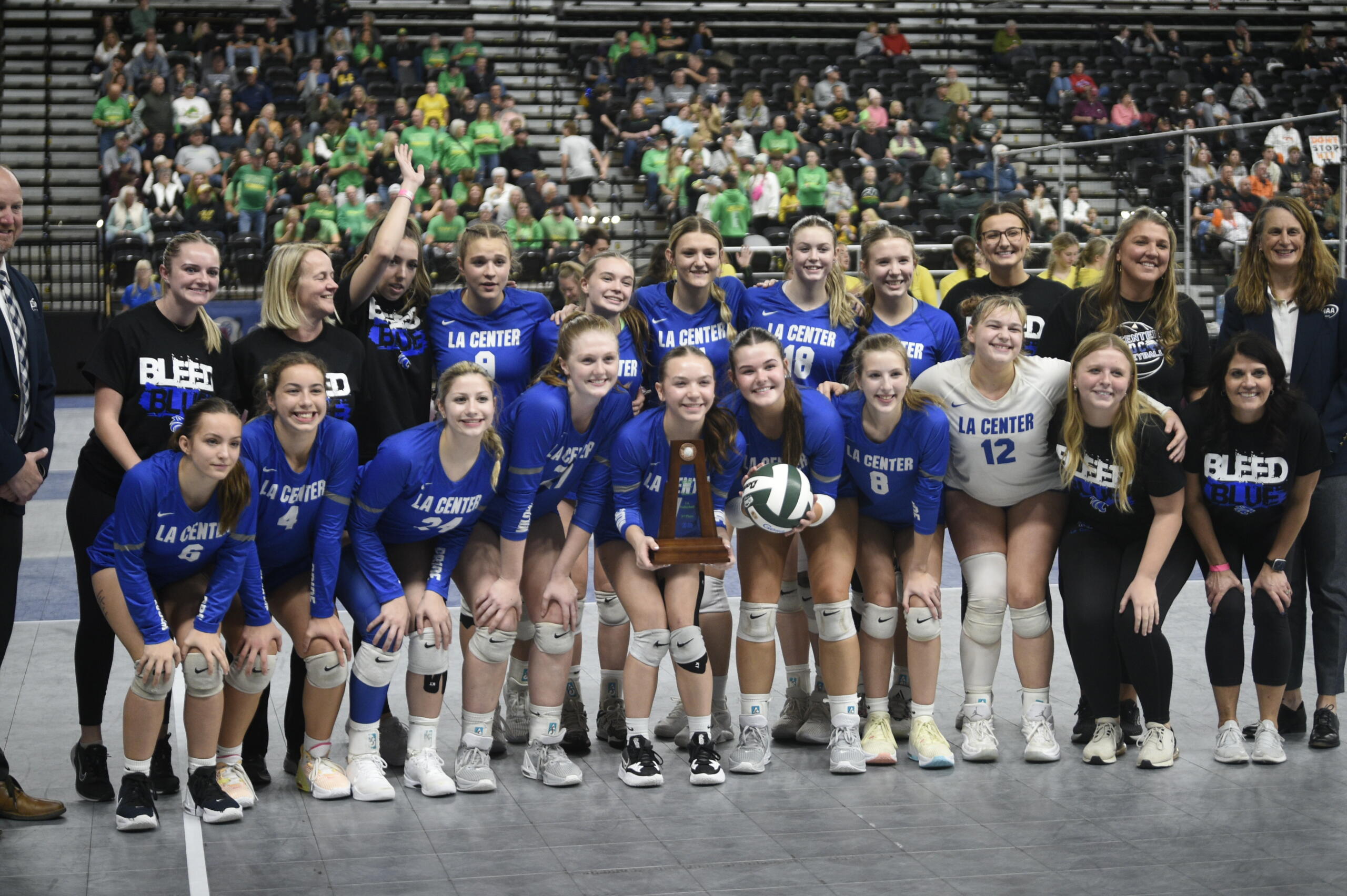 The La Center volleyball team poses with the third-place trophy at the Class 1A state volleyball tournament on Saturday, Nov, 11, 2023 in Yakima. The Wildcats beat Meridian in four sets to place third for the third time in program history and the first time since 1995.