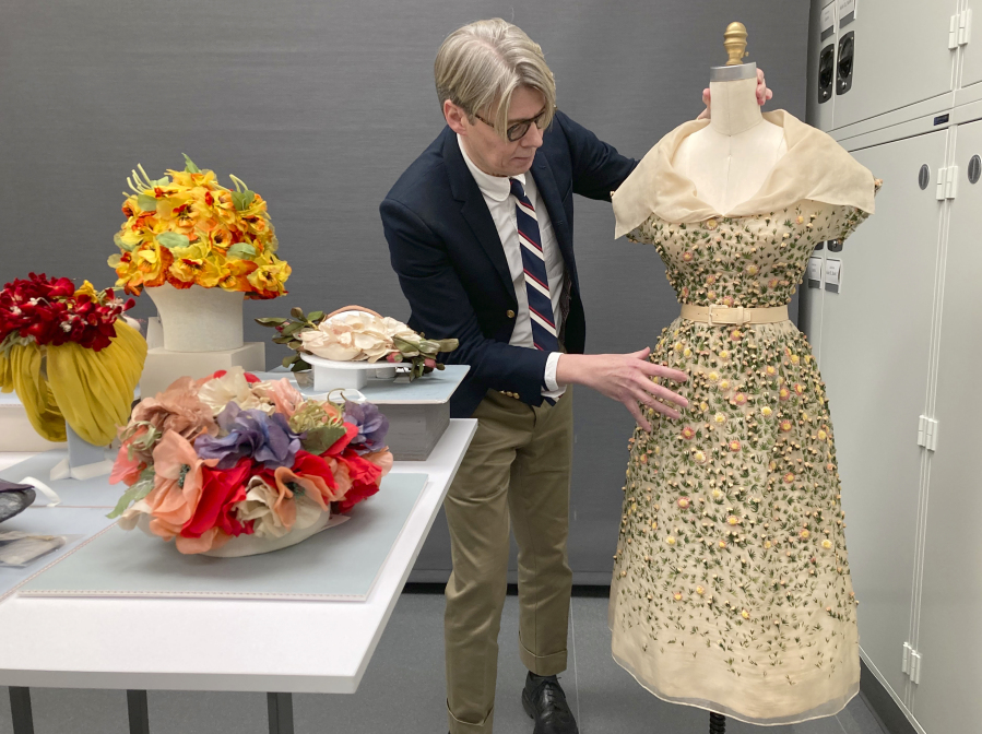 Curator Andrew Bolton displays garments Nov. 8 in the conservation space of the Costume Institute of the Metropolitan Museum of Art in Manhattan.