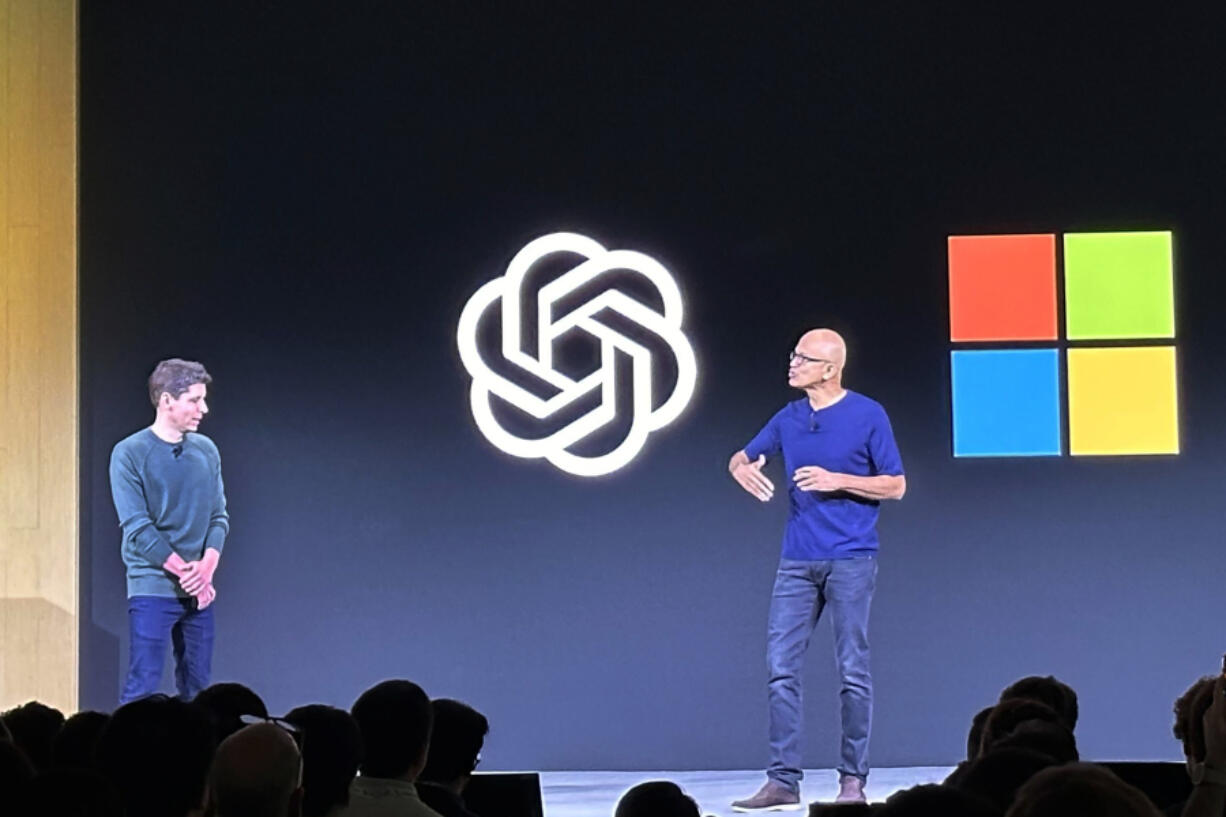 File - Sam Altman, left, appears onstage with Microsoft CEO Satya Nadella at OpenAI&rsquo;s first developer conference, on Nov. 6, 2023, in San Francisco. Microsoft snapped up Altman for a new venture after his sudden departure from OpenAI shocked the artificial intelligence world.