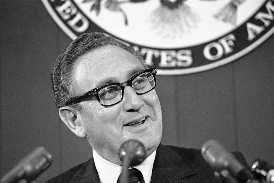 Secretary of State Henry Kissinger briefs reporters, Oct. 12, 1973, at the State Department in Washington. Kissinger, the diplomat with the thick glasses and gravelly voice who dominated foreign policy as the United States extricated itself from Vietnam and broke down barriers with China, died Wednesday. He was 100.