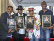 FILE - Robert &quot;Kool&quot; Bell, from left, Ronald &quot;Khalis&quot; Bell, Dennis &quot;DT&quot; Thomas and George Brown attend a ceremony honoring Kool &amp; The Gang with a star on The Hollywood Walk of Fame on Oct. 8, 2015, in Los Angeles. Brown died Nov. 16, 2023 in Los Angeles, after a battle with cancer. He was 74.
