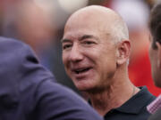 Jeff Bezos is seen on the sidelines before the start of an NFL football game between the Kansas City Chiefs and the Los Angeles Chargers Sept. 15, 2022, in Kansas City, Mo. Bezos' fund to support homeless families announced $117 million in new grants on Tuesday to organizations across the U.S. and Puerto Rico. The grants are a part of a $2 billion commitment Bezos made in 2018 to support homeless families and to run free preschools.