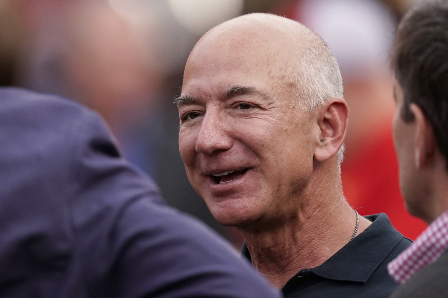 Jeff Bezos is seen on the sidelines before the start of an NFL football game between the Kansas City Chiefs and the Los Angeles Chargers Sept. 15, 2022, in Kansas City, Mo. Bezos' fund to support homeless families announced $117 million in new grants on Tuesday to organizations across the U.S. and Puerto Rico. The grants are a part of a $2 billion commitment Bezos made in 2018 to support homeless families and to run free preschools.