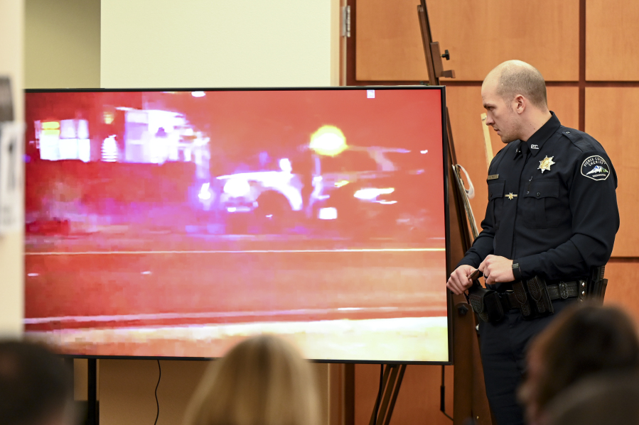 Pierce County Sheriff&rsquo;s Deputy Arron Wolfe describes what is occurring in a video of a 2019 incident involving Manny Ellis during the trial of three Tacoma police officers Monday in Pierce County Superior Court in Tacoma.