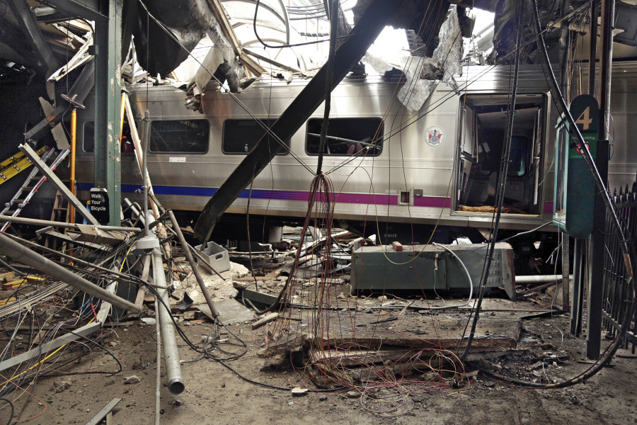 Damage from a commuter train crash that killed a woman and injured more than 100 people is seen on Sept. 29, 2016, at the Hoboken Terminal in Hoboken, N.J.