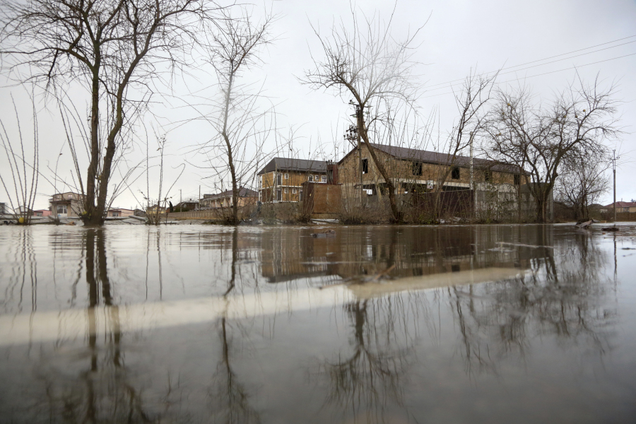 The Evpatoria - Saki highway is covered with water after a storm in Crimea, Monday, Nov. 27, 2023. A storm in the Black Sea took down power grids and left almost half a million people without power after it flooded roads, ripped up trees and damaged buildings in Crimea, Russian state news agency Tass said.