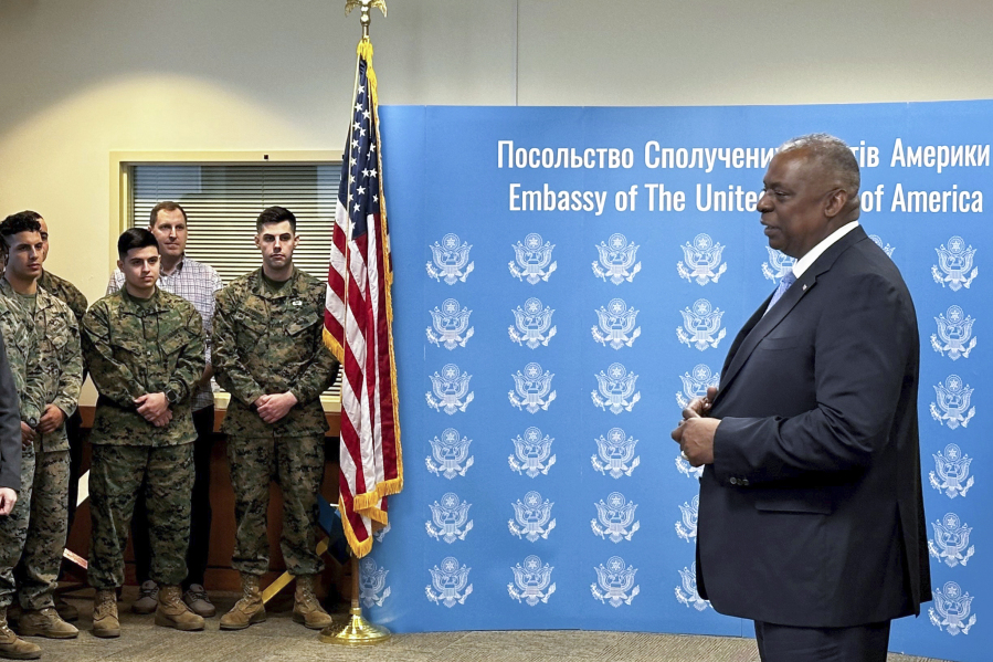 U.S. Secretary of Defense Lloyd Austin, right, speaks to employees of the U.S. embassy in Kyiv, Monday, Nov. 20, 2023, during his visit to Ukraine.  Austin has made an unannounced visit to Kyiv Monday, in what is expected to be a high-profile push to keep money and weapons flowing to Ukraine even as U.S. and international resources are stretched by the new global risks raised by the Israel-Hamas conflict.  (W.G.