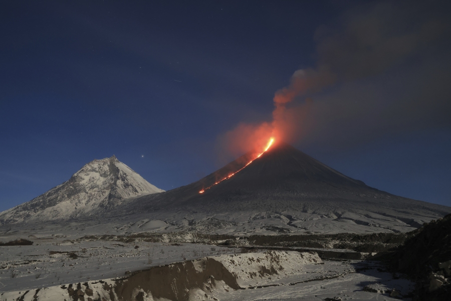 The Klyuchevskoy volcano, one of the highest active volcanoes in the world, erupts in Russia's northern Kamchatka Peninsula, Russian Far Eat, on Saturday, Oct. 28, 2023. Huge ash columns erupted from Eurasia's tallest active volcano on Wednesday, Nov. 1, 2023, forcing authorities to close schools in two towns in the region.