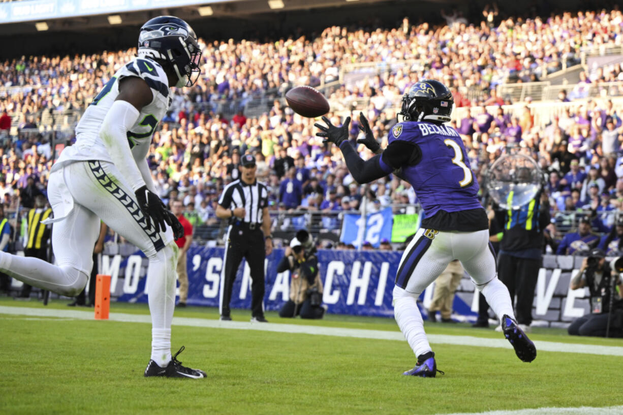 Baltimore Ravens wide receiver Odell Beckham Jr. (3) catches the ball for a touchdown during the second half of an NFL football game against the Seattle Seahawks, Sunday, Nov. 5, 2023, in Baltimore.