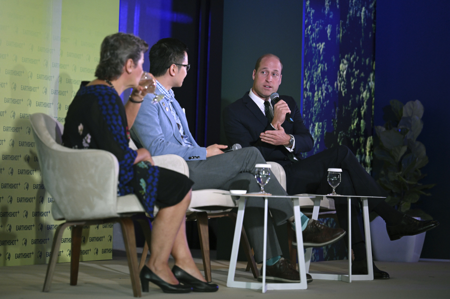 Britain&rsquo;s Prince William, right, takes part in a panel discussion on stage with Earthshot Prize trustee Christiana Figueres, left, and Brandon Ng of Ampd Energy at the Earthshot+ Summit at Park Royal Pickering in Singapore Wednesday, Nov. 8, 2023. William is on a four-day visit to Singapore, where he attended the Earthshot Prize 2023 that aims to reward innovative efforts to combat climate change.