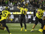 Oregon quarterback Bo Nix (10) throws against Souther California during the second half of an NCAA college football game Saturday, Nov. 11, 2023, in Eugene, Ore.
