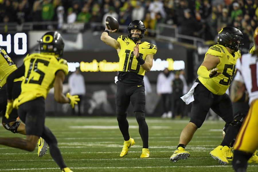 Oregon quarterback Bo Nix (10) throws against Souther California during the second half of an NCAA college football game Saturday, Nov. 11, 2023, in Eugene, Ore.