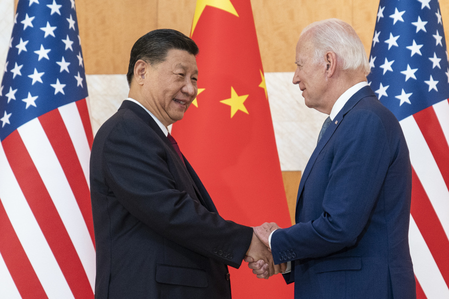 FILE - U.S. President Joe Biden, right, and Chinese President Xi Jinping shake hands before a meeting on the sidelines of the G20 summit meeting on Nov. 14, 2022, in Bali, Indonesia. Biden and Xi will hold a long-anticipated meeting Wednesday in the San Francisco Bay area. That&rsquo;s according to two senior Biden administration officials.