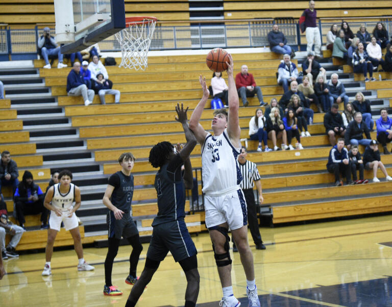 Skyview's Jaxson Filler (33) takes a shot during the Storm's game against Glacier Peak at Skyview High School on Saturday, Dec. 2, 2023.