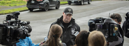 Clark County sheriff&rsquo;s Sgt. Chris Skidmore speaks to members of the media after five people died in an apparent murder-suicide Sunday at a home in Orchards, as seen Monday afternoon.