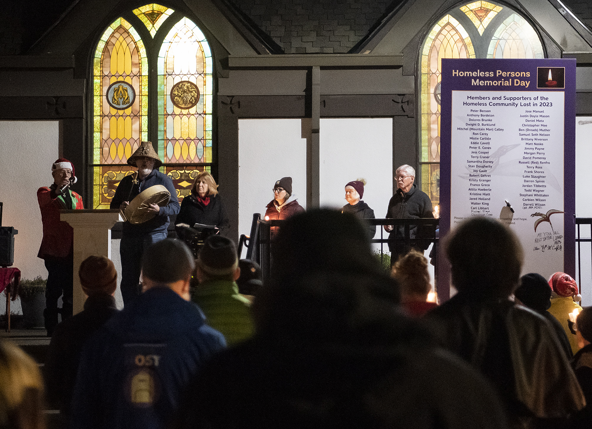 Chinook Indian Nation vice chairman Sam Robinson, left, sings a blessing song Friday, Dec. 21, 2023, during a Homeless Persons Memorial Day event at St. Paul Lutheran Church in downtown Vancouver.