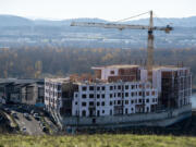 Construction continues at The Ledges at Palisades in Camas on Tuesday morning. The multifamily development is one of several around the county slated to come online in the coming years.