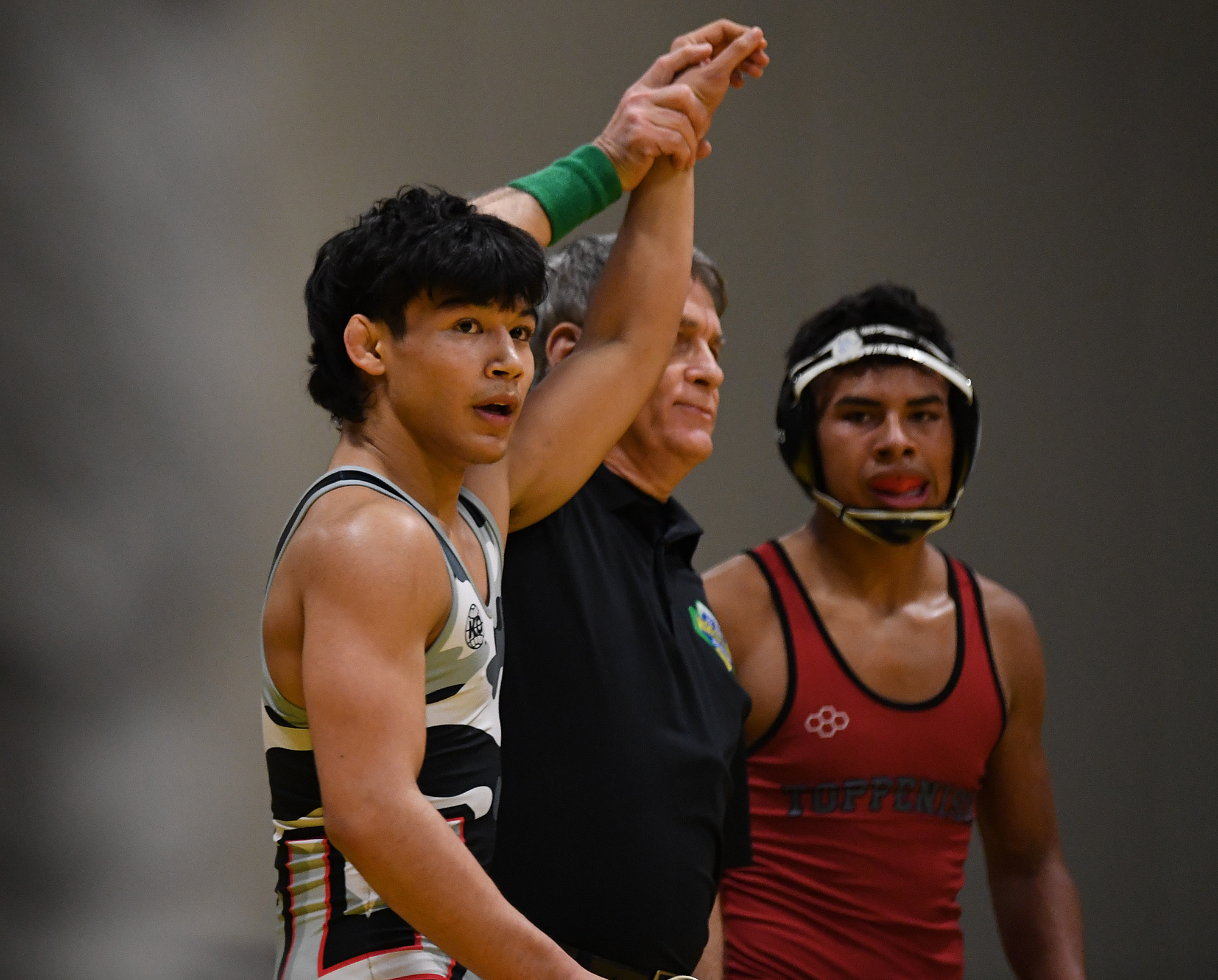 Union junior Noah Koyama is declared the winner of his bout with Toppenish sophomore Ruben Rios on Friday, Dec. 22, 2023, during a 138-pound champinoship bout at the Pac Coast Wrestling Championships at the Clark County Event Center in Ridgefield.