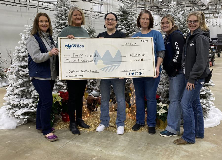 Furry Friends received $4,000 from Wilco Farm Stores&rsquo; Boots &amp; Blues Bag benefit.