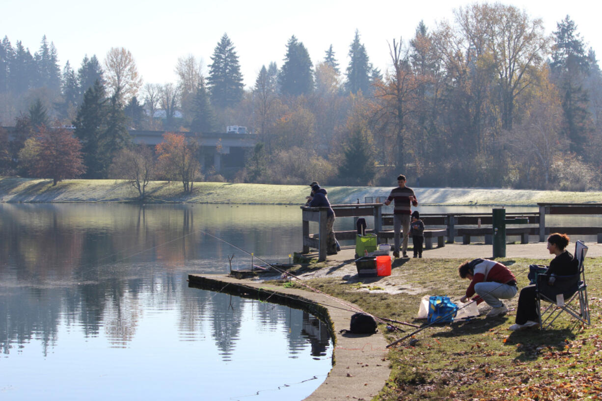Anglers gather at Klineline Pond to fish for trout. The lake was red-hot after the Black Friday stockings, but has since slowed. Upcoming stockings will revive the bite.