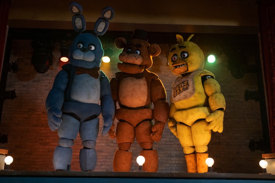 From left, Bonnie, Freddy Fazbear and Chica in &ldquo;Five Nights at Freddy&rsquo;s.&rdquo; (Patti Perret/Universal Pictures/TNS)
