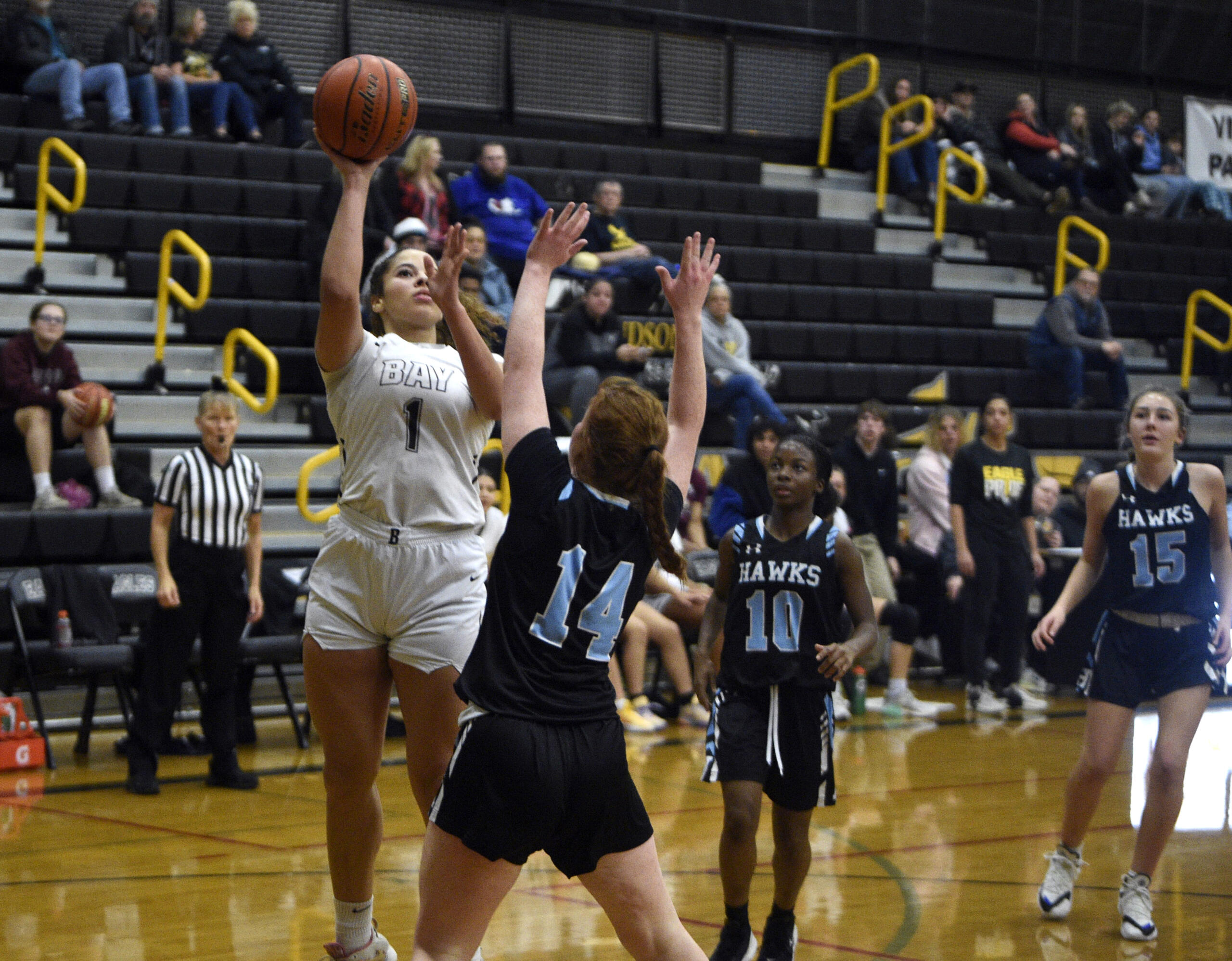 Hudson’s Bay’s Alana Stephens puts up a shot over Hockinson during a 2A Greater St. Helens League girls basketball game on Friday, Dec. 8, 2023, at Hudson’s Bay High School.