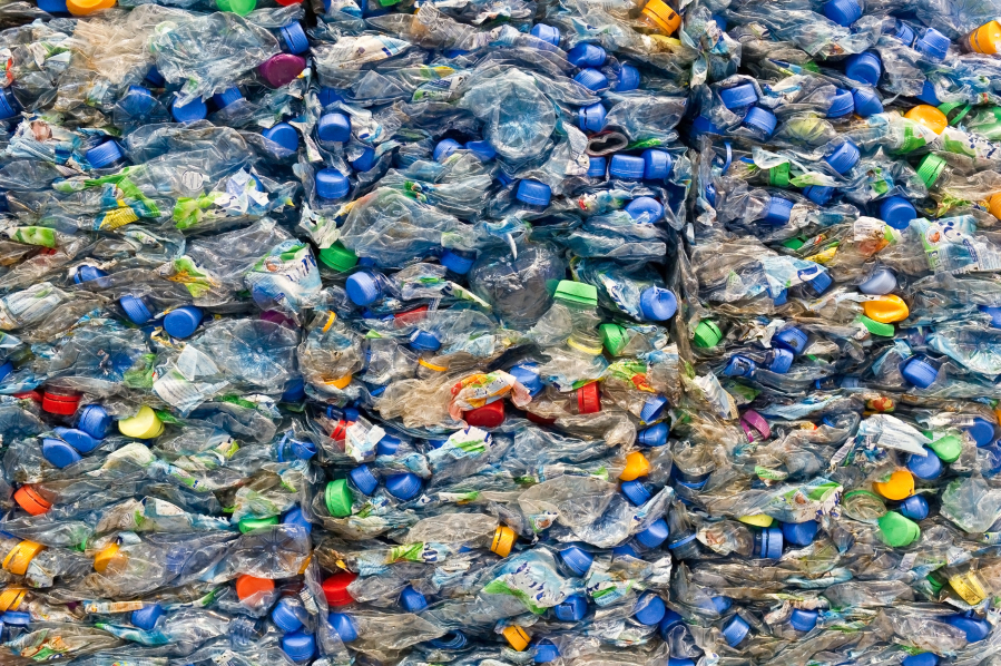 Large stacks of plastic bottles due to be recycled. Every year, the U.S. generates roughly 40 million tons of plastic, and at best, less than 9% of it is recycled.