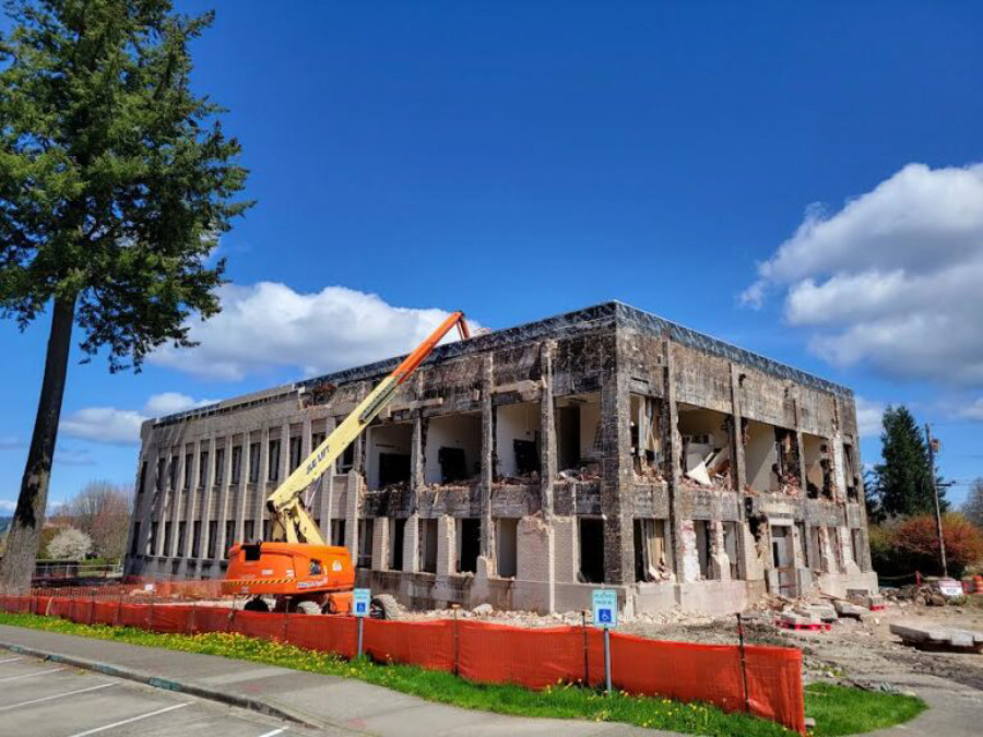 Demolition of the Irving Newhouse Building on the campus of the Washington state Capitol in 2023. A new building is going up on the site and an effort is underway to ensure the new building has the same name.