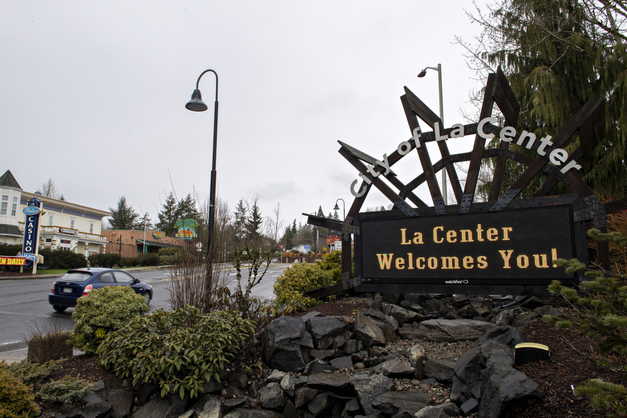 A sign welcomes visitors and residents to La Center.