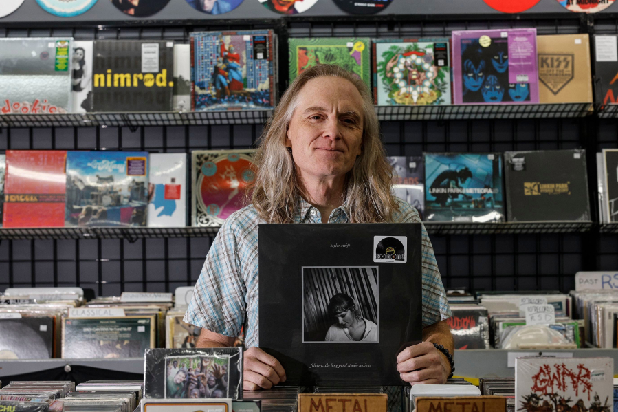 Copies of Taylor Swift&rsquo;s &ldquo;Folklore: The Long Pond Studio Sessions&rdquo; were still available at Young Ones Records in Kutztown, Pa. Owner Chris Holt holds the shop&rsquo;s last copy, which will be a giveaway prize. (Steven M.