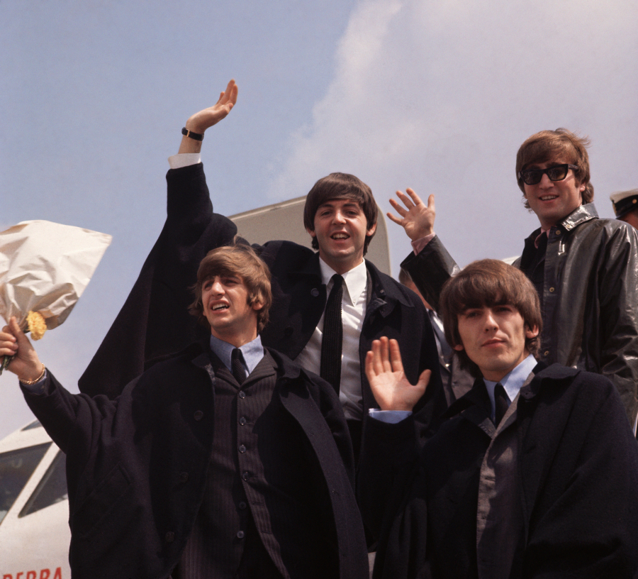 From left, Ringo Starr, Paul McCartney, George Harrison and John Lennon of the Beatles arrive in London on July 2, 1964, following a tour of Australia.
