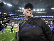 FILE - Washington coach Kalen DeBoer smiles after the team&rsquo;s victory over Oregon in the Pac-12 championship NCAA college football game, Dec. 1, 2023, in Las Vegas. DeBoer has made a rapid rise through the coaching ranks. He won three NAIA national championships as head coach at the University of Sioux Falls from 2005-09 and had five coaching stops in 12 years before landing at Washington.