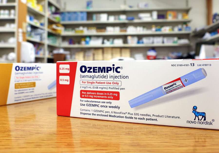 Boxes of the diabetes drug Ozempic rest on a pharmacy counter on April 17 in Los Angeles. America's Poison Centers reported nearly 3,000 calls this year involving the weight-loss drug.