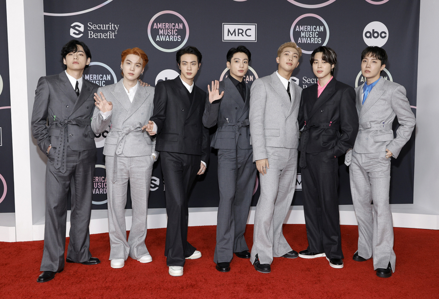 From left, V, Suga, Jin, Jungkook, RM, Jimin, and J-Hope of BTS attend the 2021 American Music Awards at Microsoft Theater on Nov. 21, 2021, in Los Angeles.