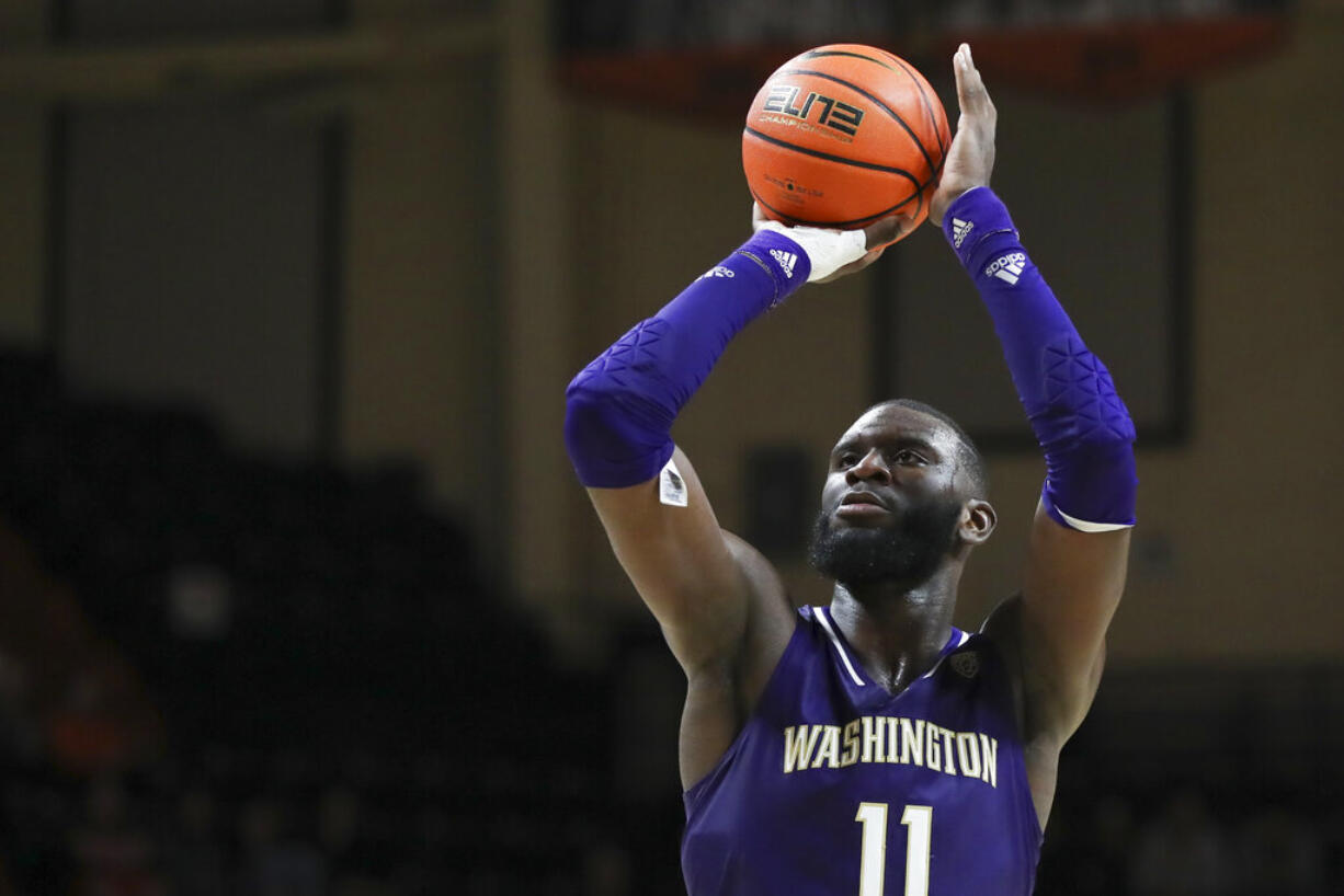 Washington center Franck Kepnang (11) had a double-double of 16 points and 11 rebounds to lead Washington to an 85-61 victory over Montana State on Tuesday, Dec. 5, 2023.