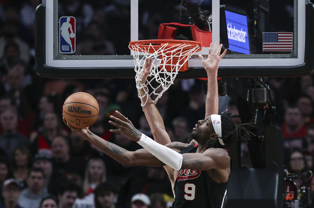 Portland Trail Blazers forward Jerami Grant drives to the basket against the San Antonio Spurs during the second half of an NBA basketball game Friday, Dec. 29, 2023, in Portland, Ore.