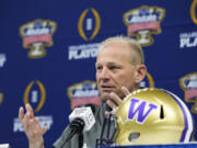 Washington head coach Kalen DeBoer speaks during media day for the the upcoming Sugar Bowl NCAA CFP college football semi-final game against Washington in New Orleans, Saturday, Dec. 30, 2023.