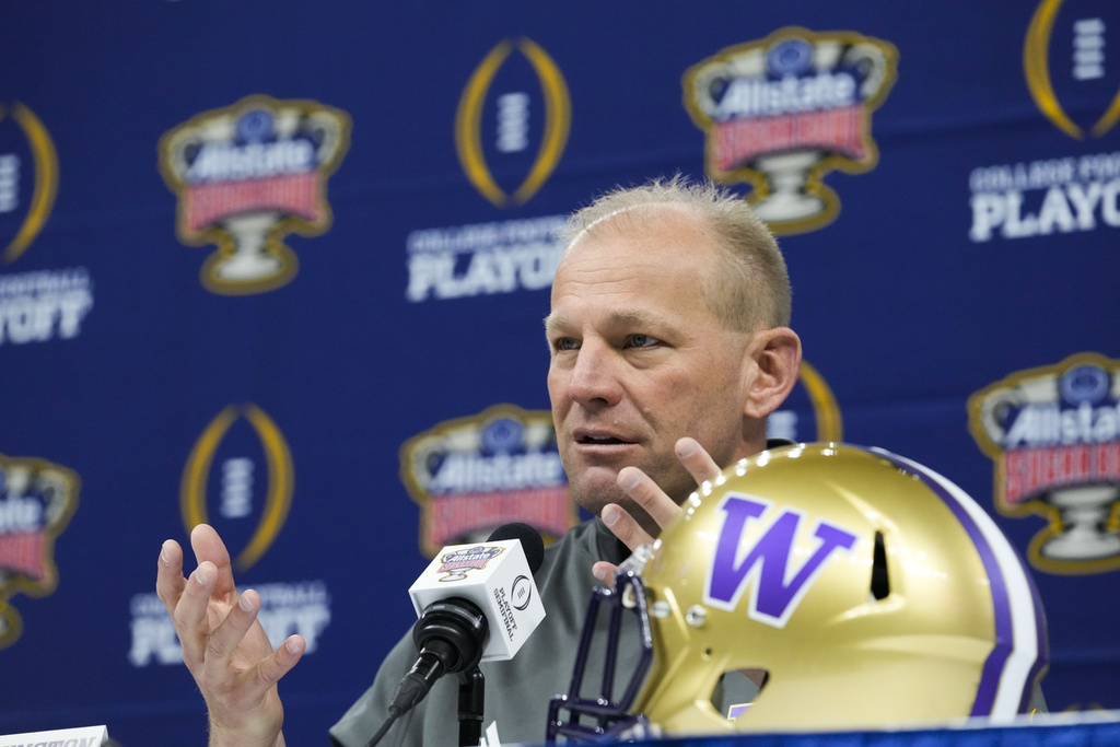Washington head coach Kalen DeBoer speaks during media day for the the upcoming Sugar Bowl NCAA CFP college football semi-final game against Washington in New Orleans, Saturday, Dec. 30, 2023.