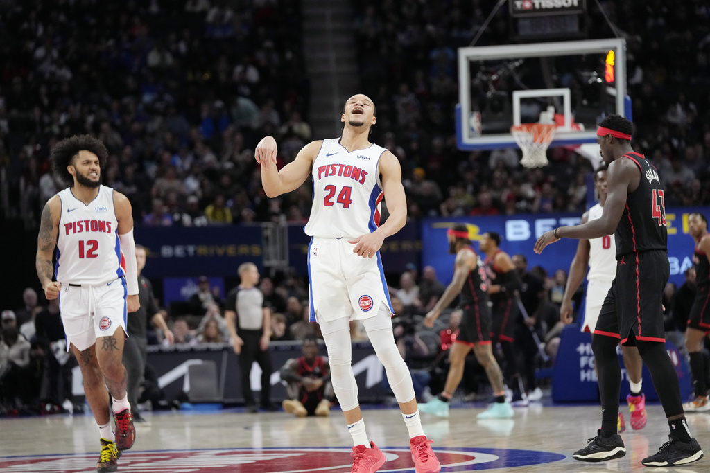 Detroit Pistons forward Kevin Knox II (24) reacts after a three-point basket during the first half of an NBA basketball game against the Toronto Raptors, Saturday, Dec. 30, 2023 in Detroit.