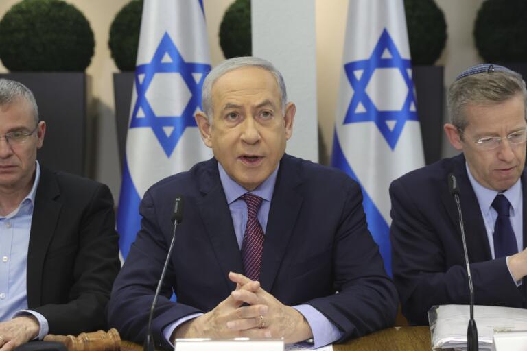 Israeli Prime Minister Benjamin Netanyahu attends the weekly cabinet meeting at the the Kirya military base in Tel Aviv, Israel, Sunday Dec. 31, 2023.