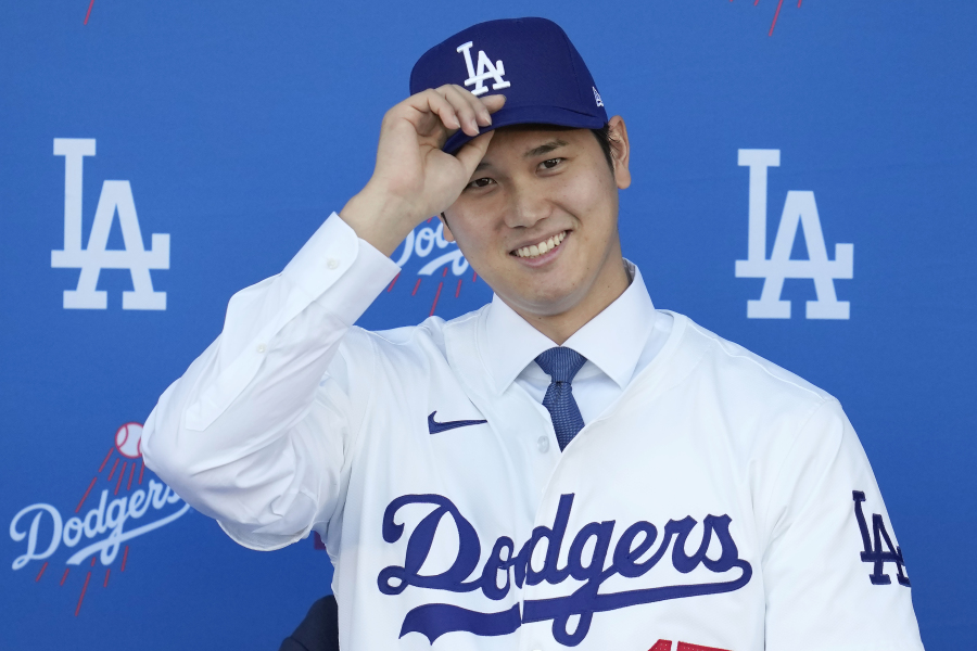 Los Angeles Dodgers&rsquo; Shohei Ohtani smiles during a baseball news conference at Dodger Stadium Thursday, Dec. 14, 2023, in Los Angeles.