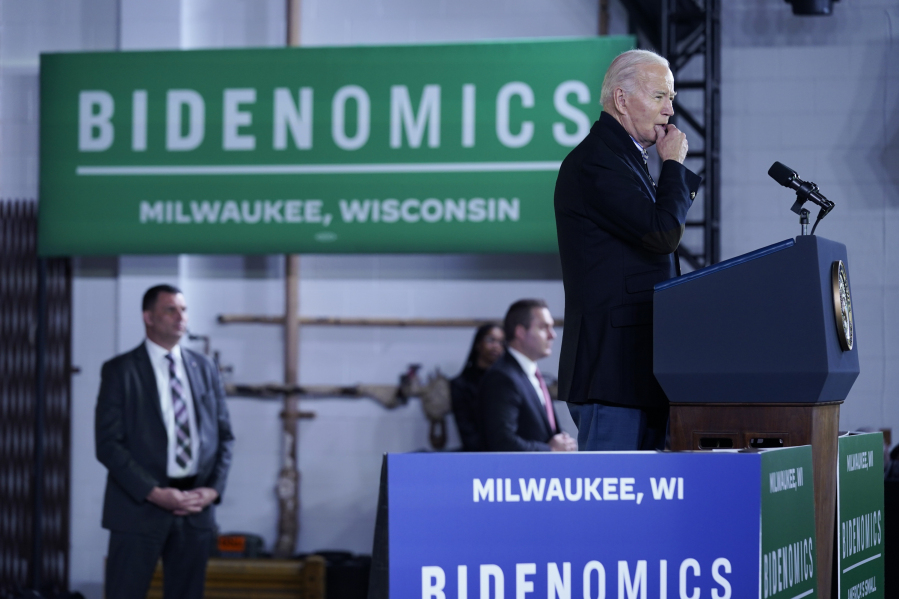 President Joe Biden pauses as he speaks about his economic agenda at the Wisconsin Black Chamber of Commerce, Wednesday, Dec. 20, 2023, in Milwaukee.