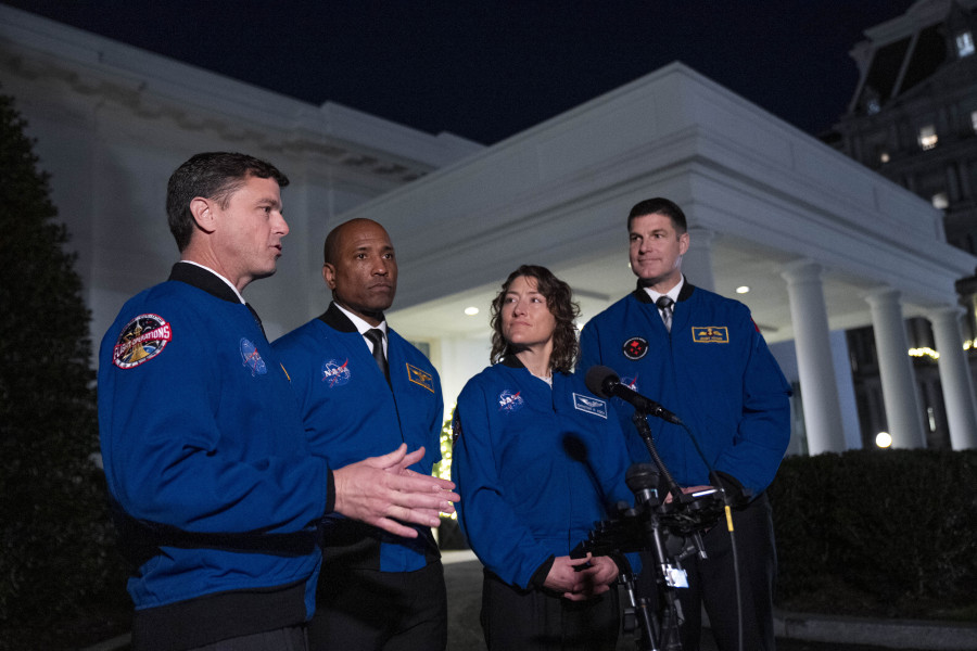 Artemis II crew members from left, Reid Wiseman, Victor Glover, Christina Hammock Koch, and Jeremy Hansen speak to members of the media outside the West Wing of the White House in Washington, Thursday, Dec. 14, 2023, after meeting with President Joe Biden.