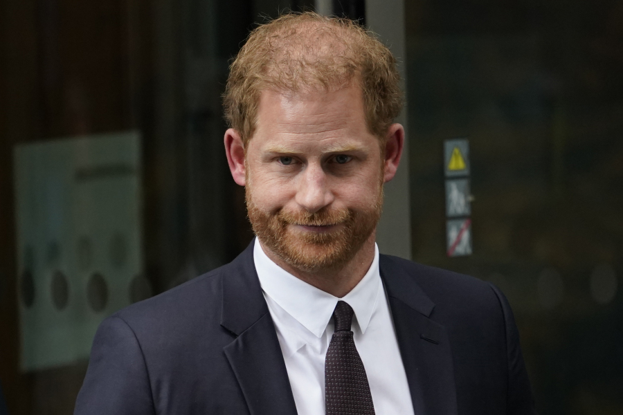 FILE - Prince Harry leaves the High Court after giving evidence in London, Tuesday, June 6, 2023. A judge ordered Prince Harry on Monday, Dec. 11, 2023, to pay nearly 50,000 pounds (over $60,000) in legal fees to the publisher of the Daily Mail tabloid for failing to knock out its defense in a libel lawsuit.