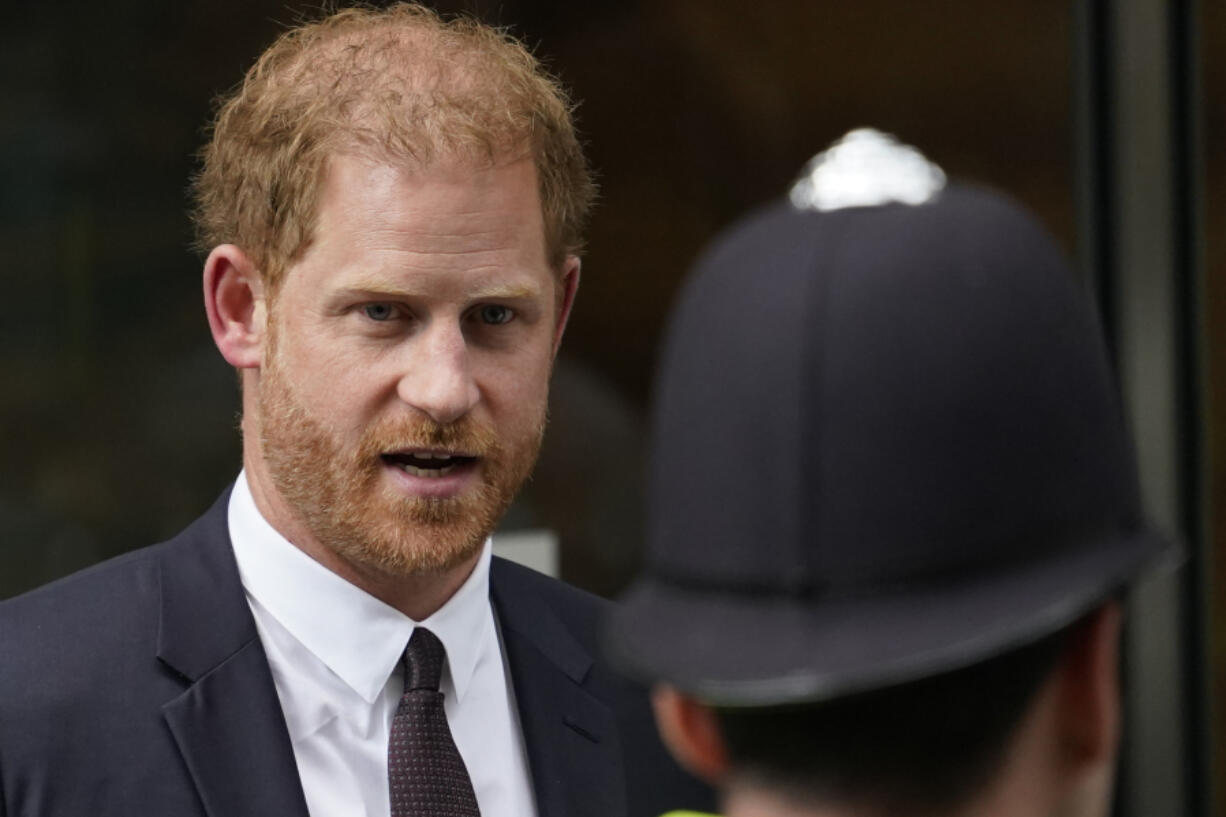FILE - Prince Harry leaves the High Court after giving evidence in London, Tuesday, June 6, 2023. Prince Harry is challenging on Tuesday, Dec. 5, 2023, the British government&rsquo;s decision to strip him of his security detail after he gave up his status as a working member of the royal family and moved to the United States. The Duke of Sussex said he wants protection when he visits home and claimed it&rsquo;s partly because an aggressive press jeopardizes his safety and that of his family.