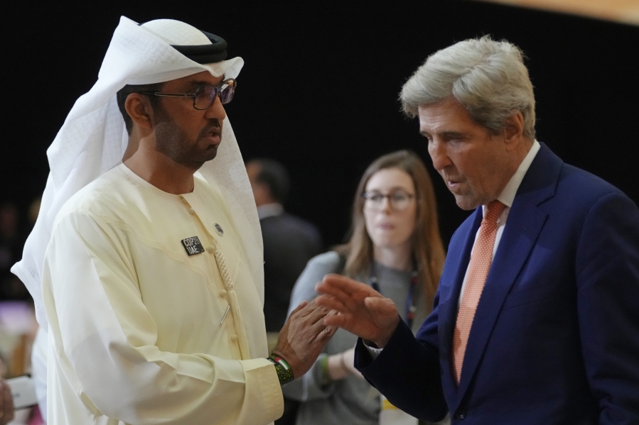 COP28 President Sultan al-Jaber, left, and John Kerry, U.S. Special Presidential Envoy for Climate, speak as they attend a meeting at the COP28 U.N. Climate Summit, Sunday, Dec. 10, 2023, in Dubai, United Arab Emirates.