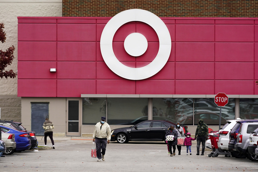 FILE - A Target store is seen, Nov. 17, 2021, in Philadelphia. Business closings on Christmas Eve are less common than those on Christmas Day, but many large chains still cut back hours or close up shop early for the coming holiday. Most Target stores will be open from 7 a.m. to 8 p.m. on Christmas Eve, Sunday, Dec. 24, 2023.