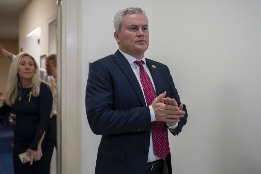 FILE - House Oversight and Accountability Committee Chairman James Comer, R-Ky., emerges from the committee room, followed by Rep. Marjorie Taylor Greene, R-Ga., to speak to reporters after Hunter Biden, President Joe Biden&#039;s son, defied a congressional subpoena to appear privately for a deposition before Republican investigators who have been digging into his business dealings, at the Capitol in Washington, Wednesday, Dec. 13, 2023. (AP Photo/J.