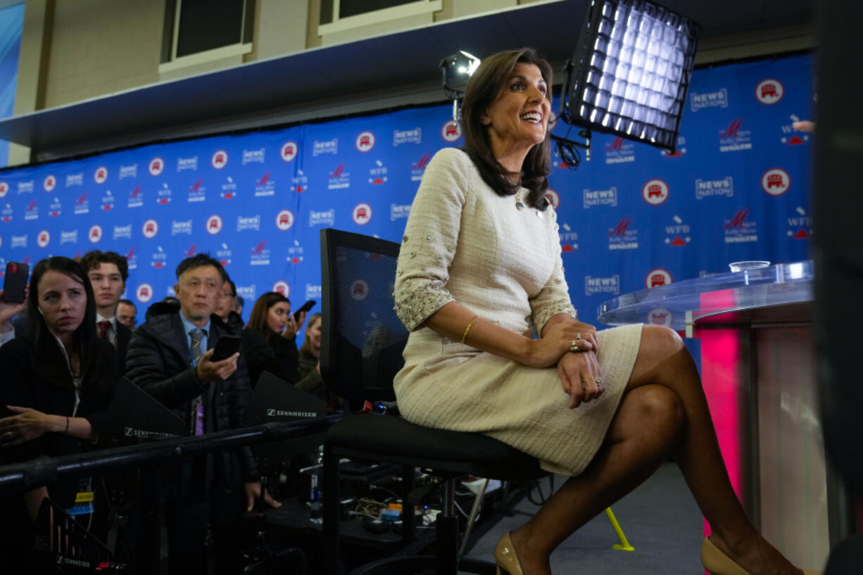 Republican presidential candidate former U.N. Ambassador Nikki Haley answering questions in the Spin Room after the Republican presidential primary debate hosted by NewsNation on Wednesday, Dec. 6, 2023, at the Moody Music Hall at the University of Alabama in Tuscaloosa, Ala.