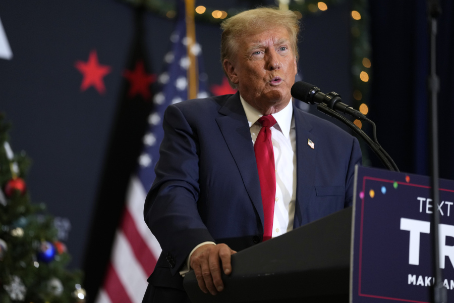 FILE - Former President Donald Trump speaks during a commit to caucus rally, Tuesday, Dec. 19, 2023, in Waterloo, Iowa. Trump pressured two election officials not to certify 2020 vote totals in a key Michigan county, according to a recording of a post-election phone call disclosed in a new report by The Detroit News. The former president&rsquo;s 2024 campaign has not confirmed or denied the recording&rsquo;s legitimacy.